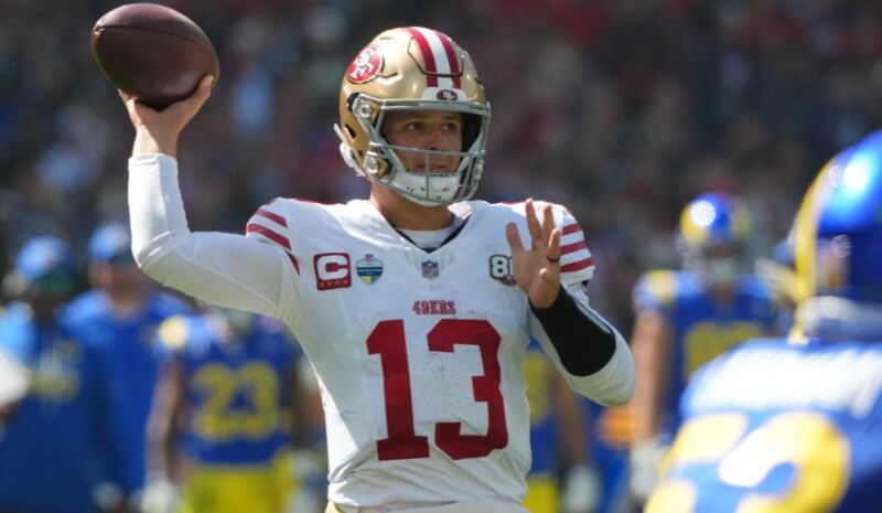 San Francisco 49ers quarterback Brock Purdy (13) drops back to pass.