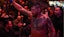 Anthony Hernandez (blue gloves) leaves the ring after defeating Brendan Allen.