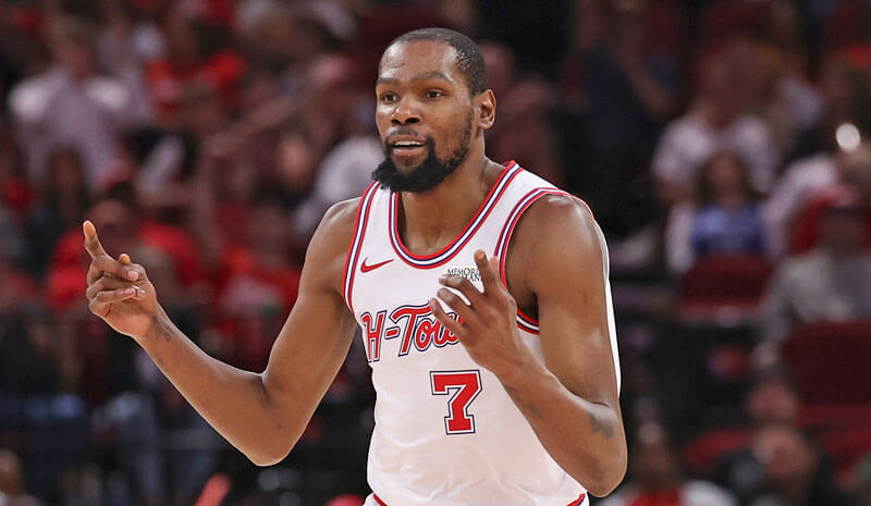 Houston Rockets forward Kevin Durant (7) reacts after scoring a basket.