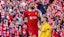 Liverpool's Mohamed Salah celebrates after scoring during the English Premier League match.