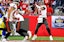 Tampa Bay Buccaneers quarterback Tom Brady (12) throws a pass during the second half against the Los Angeles Rams in a NFC Divisional playoff football game at Raymond James Stadium.