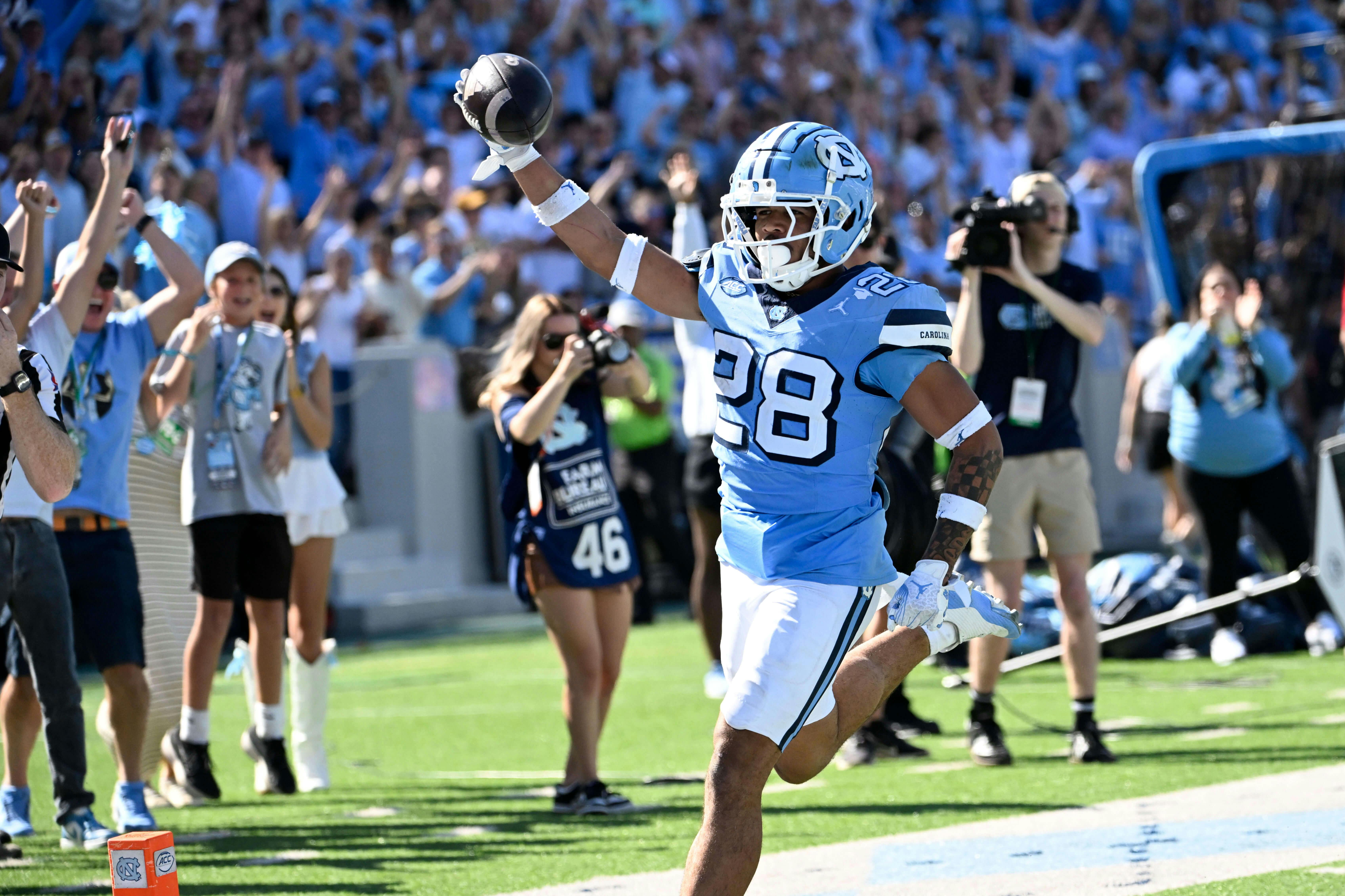 North Carolina Tar Heels running back Omarion Hampton (28) runs for a touchdown in the third quarter at Kenan Memorial Stadium. Mandatory Credit: Bob Donnan-Imagn Images