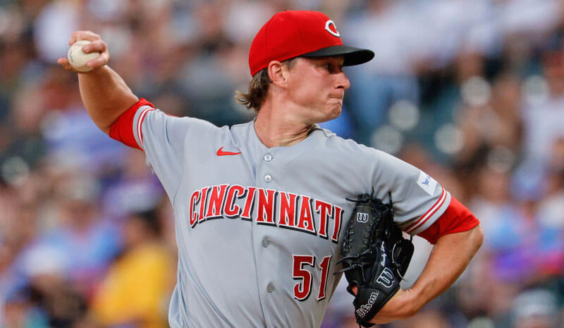 Cincinnati Reds starting pitcher Brady Singer (51).