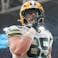 Green Bay Packers tight end Tucker Kraft (85) celebrates a touchdown against the Arizona Cardinals during the second half at State Farm Stadium.