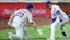 New York Mets right fielder Juan Soto (22) is greeted by first baseman Pete Alonso (20).