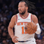 New York Knicks guard Jalen Brunson (11) dribbles up court during the second half against the Charlotte Hornets at Madison Square Garden.