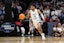 North Carolina Tar Heels guard RJ Davis (4) controls the ball in the second half against the Alabama Crimson Tide in the semifinals of the West Regional of the 2024 NCAA Tournament at Crypto.com Arena. Mandatory Credit: Kirby Lee-Imagn Images