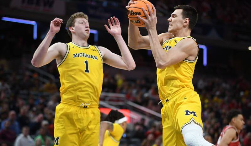 Michigan Wolverines center Danny Wolf (1) and center Vladislav Goldin (50).