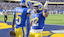 Los Angeles Rams wide receiver Tutu Atwell (5) is congratulated by wide receiver Puka Nacua (12) after he ran for a touchdown.