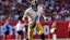 Pittsburgh Steelers quarterback Aaron Rodgers (8) runs the ball.