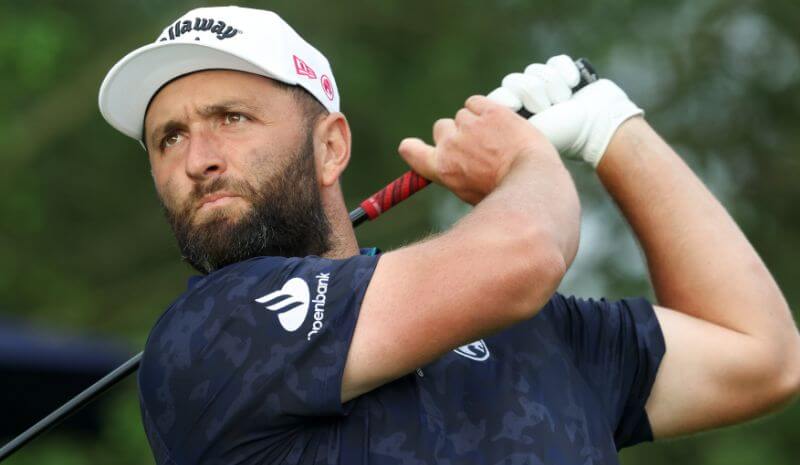 Jon Rahm plays his shot from the first tee during the second round of the U.S. Open.