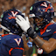 Virginia Cavaliers wide receiver Trell Harris (11) celebrates with Cavaliers tight end Dakota Twitty (9) after catches a two point conversion.