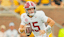 Alabama Crimson Tide quarterback Ty Simpson (15) rolls out to pass during the second half against the Missouri Tigers at Faurot Field at Memorial Stadium.