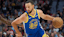 Golden State Warriors guard Stephen Curry (30) drives past Portland Trail Blazers guard Jrue Holiday (5) during the first half at Moda Center.