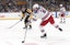 New York Rangers left wing J.T. Miller (8) shoots to score an empty net goal against the Pittsburgh Penguins during the third period at PPG Paints Arena. Mandatory Credit: Charles LeClaire-Imagn Images