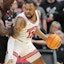 Houston Cougars forward J’Wan Roberts (13) works the ball against Texas Tech Red Raiders foward Fedeiko Federiko (33).