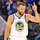 Golden State Warriors guard Stephen Curry (30) celebrates a 3-point shot.