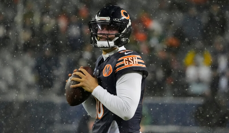 Chicago Bears quarterback Caleb Williams (18) warms up.