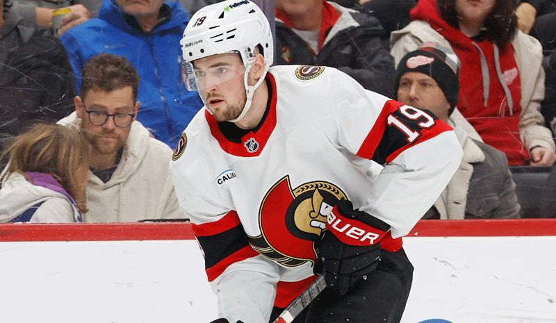 Drake Batherson (19) skates with the puck in the first period against the Detroit Red Wings at Little Caesars Arena.
