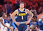 Denver Nuggets forward Michael Porter Jr. (1) walks down the court after a play against the Oklahoma City Thunder during the second quarter at Paycom Center. Alonzo Adams-Imagn Images