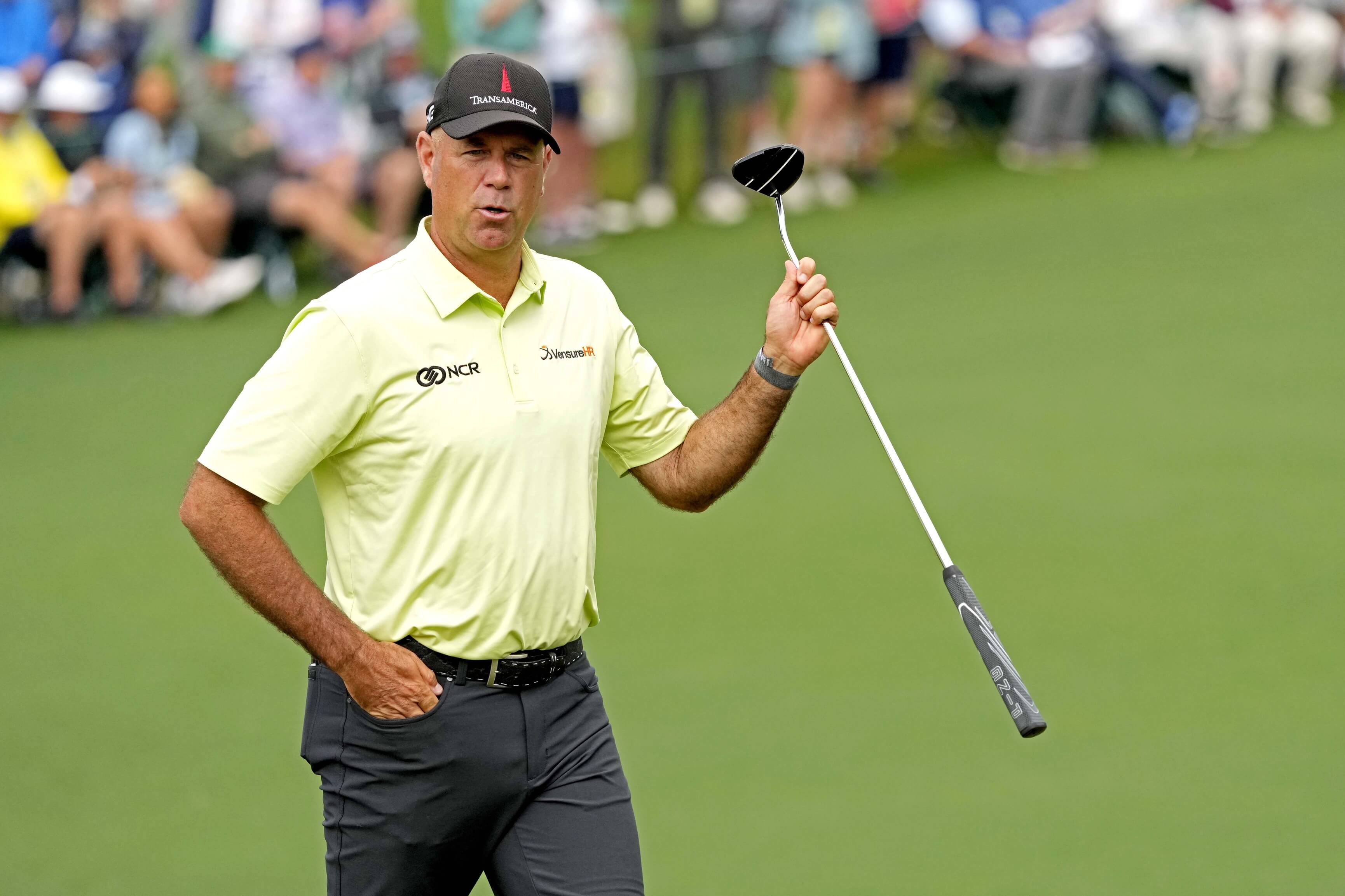 Stewart Cink reacts to his putt on the second hole during the first round of The Masters golf tournament.