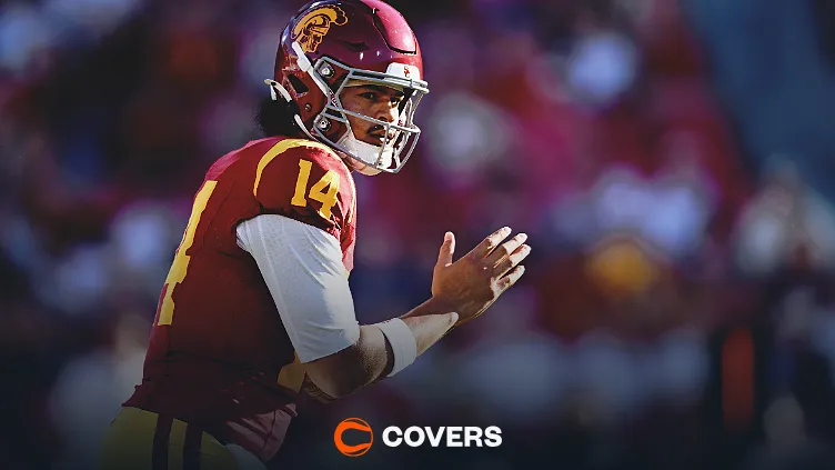 USC vs Penn State Predictions. USC QB Jordan Maiava stands at the line of scrimmage.