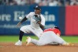 New York Yankees second baseman Jazz Chisholm Jr. (13) catches a throw and tags out Boston Red Sox designated hitter Nate Eaton (40) attempting to steal second base during the third inning at Yankee Stadium. Gregory Fisher-Imagn Images