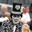 A Las Vegas Raiders fan awaits the start of a game between the Raiders and the Cleveland Browns at Allegiant Stadium.