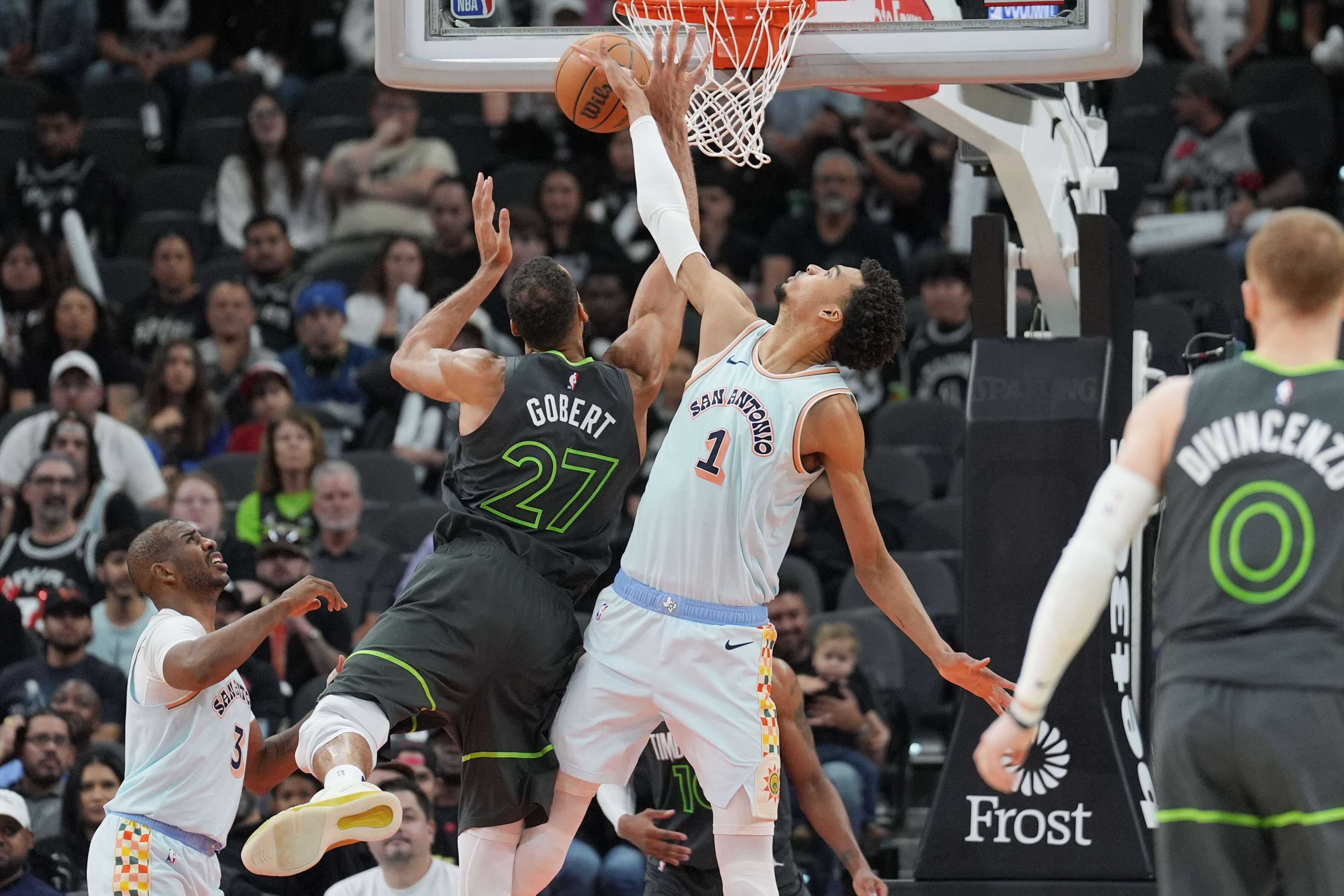 San Antonio Spurs center Victor Wembanyama (1) blocks a shot by Minnesota Timberwolves center Rudy Gobert (27) in the second half at Frost Bank Center. Mandatory Credit: Daniel Dunn-Imagn Images