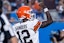 Cleveland Browns quarterback Shedeur Sanders (12) celebrates after a touchdown in the second quarter against the Carolina Panthers at Bank of America Stadium. Scott Kinser-The USAToday Network via Imagn Images