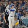 Los Angeles Dodgers two-way player Shohei Ohtani (17) hits a solo home.