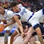 Drake Bulldogs forward Cam Manyawu (3) drives to the basket as teammate Isaiah Jackson (4) topples over Belmont Bruins guard Carter Whitt (2) during the second half at Enterprise Center. Ron Johnson-Imagn Images