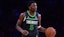 Minnesota Timberwolves guard Anthony Edwards (5) moves the ball.