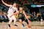 Golden State Warriors guard Stephen Curry (30) dribbles the ball against Dallas Mavericks guard Luka Doncic (77) during the second half of game five of the 2022 western conference finals at Chase Center.