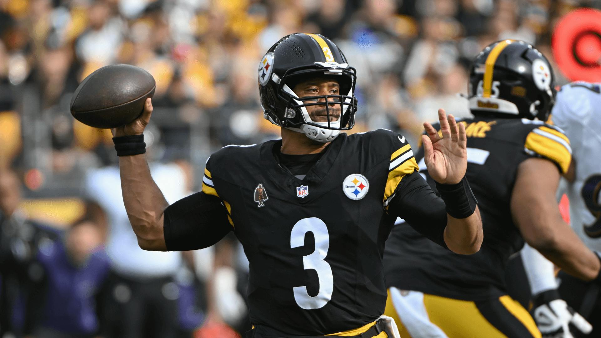 Pittsburgh Steelers quarterback Russell Wilson (3) throws a pass against the Baltimore Ravens.