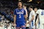 Kansas Jayhawks guard Zeke Mayo (5) reacts after scoring against the Creighton Bluejays during the first half at CHI Health Center Omaha. Mandatory Credit: Steven Branscombe-Imagn Images