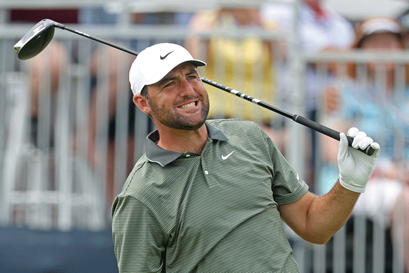 U.S. Open odds and win probability, Scottie Scheffler reacts after a tee shot.