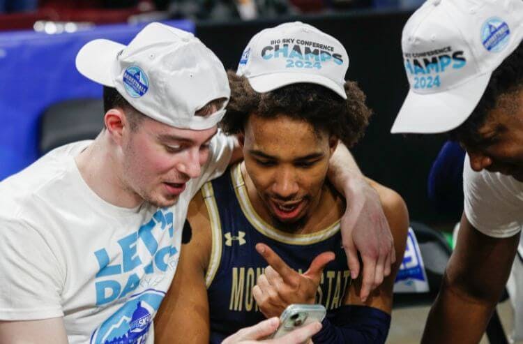 Montana State Bobcats guard Patrick McMahon (1) and guard Robert Ford III (20) and forward Brandon Walker (2)