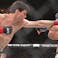Mike Malott (red gloves) fights Charles Radtke (blue gloves) during UFC 315 at Bell Centre.