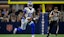Dallas Cowboys quarterback Joe Milton III (10) runs with the bal.