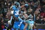 Carolina Panthers running back Chuba Hubbard (30) celebrates with offensive tackle Taylor Moton (72) and wide receiver Jalen Coker (18) after scoring on a 1-yard touchdown run against the New York Giants in the second half during the 2024 NFL Munich Game.