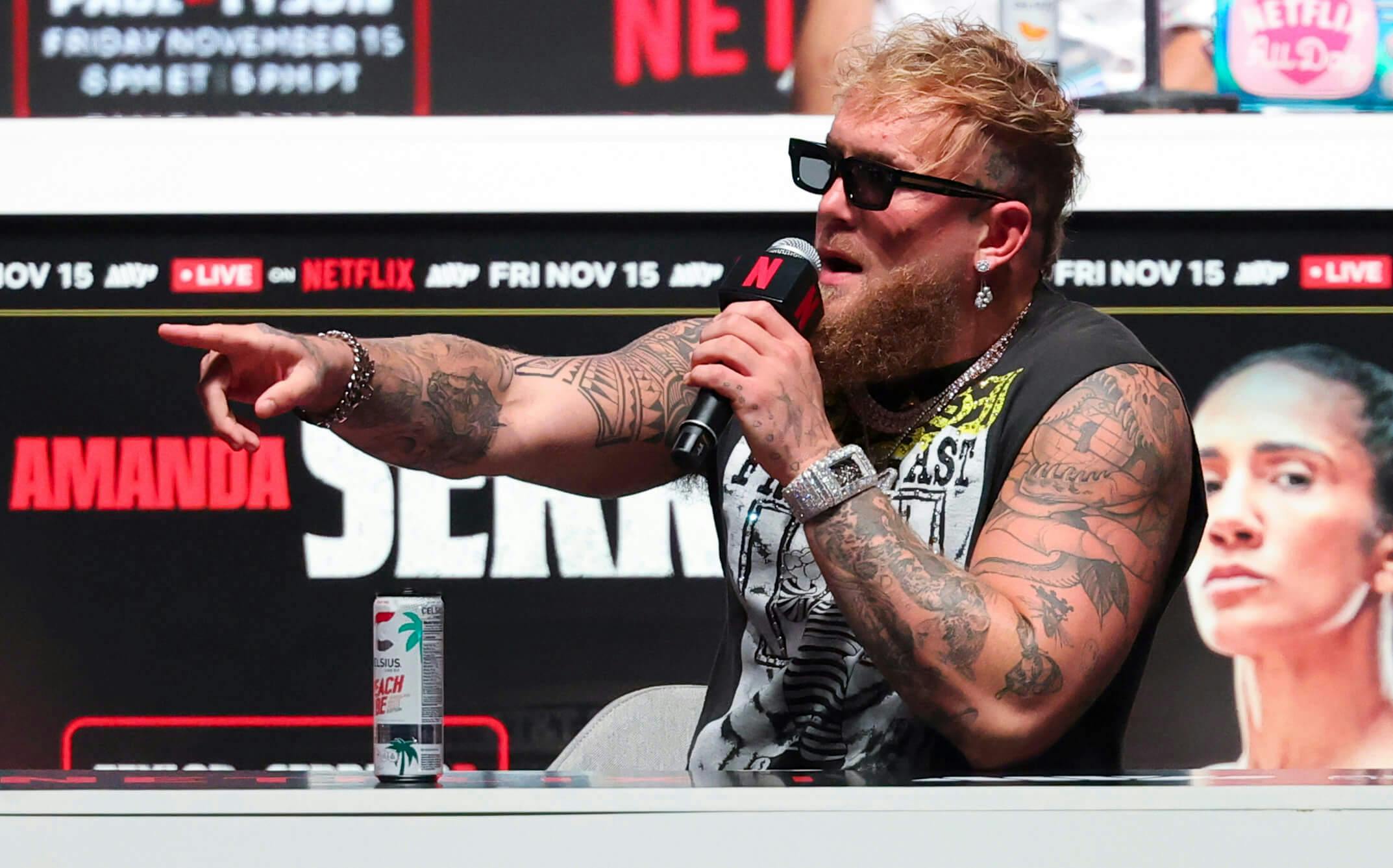 Jake Paul speaks to the media about his upcoming fight with Mike Tyson at The Pavilion at Toyota Music Factory. Mandatory Credit: Kevin Jairaj-Imagn Images