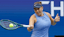 Amanda Anisimova (USA) hits a forehand against Iga Swiatek.
