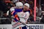 Edmonton Oilers center Ryan Nugent-Hopkins (93) celebrates his empty net goal scored against the Los Angeles Kings with center Connor McDavid (97) during the third period in game five of the first round of the 2025 Stanley Cup Playoffs at Crypto.com Arena.