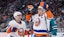 New York Islanders left wing Anders Lee (27) celebrates with center Jean-Gabriel Pageau (44).