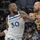 Minnesota Timberwolves forward Julius Randle (30) drives to the basket as Indiana Pacers center Jay Huff (32) defends during the first quarter at Target Center.