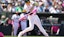 Athletics designated hitter Brent Rooker (25) hits a single.