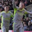 Manchester City's Erling Haaland (right) celebrates with Phil Foden.