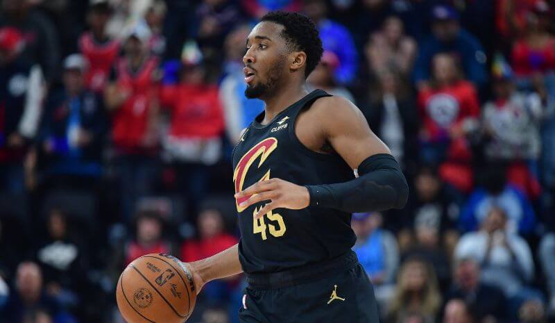 Cleveland Cavaliers guard Donovan Mitchell (45) controls the ball.