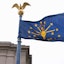 The Indiana state flag flies outside the Indiana Statehouse, Wednesday, March 6, 2024, in Indianapolis.